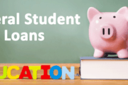 A piggy bank on a table with the words "Federal Student Loans" and "Education" next to it