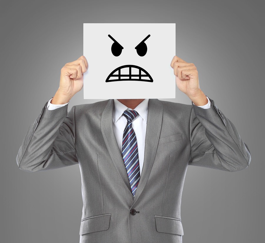 Businessman With Angry Mask