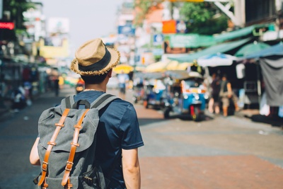 A young man taking a gap year by backpacking in Thailand
